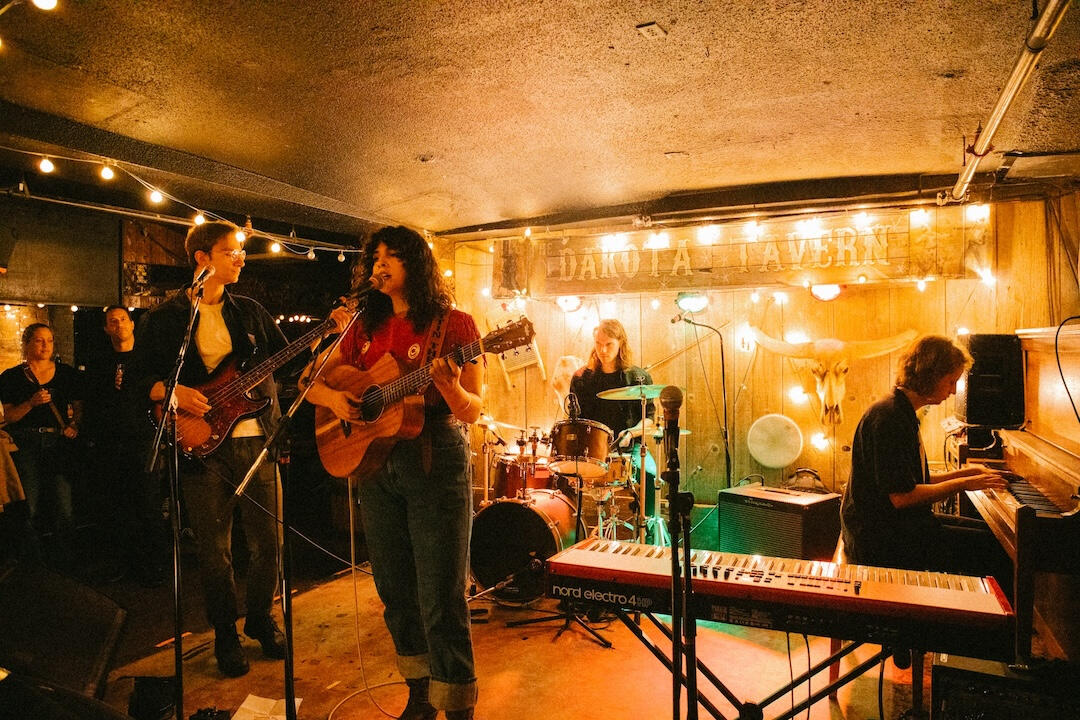 Dante on stage with her band at the Dakota Tavern
